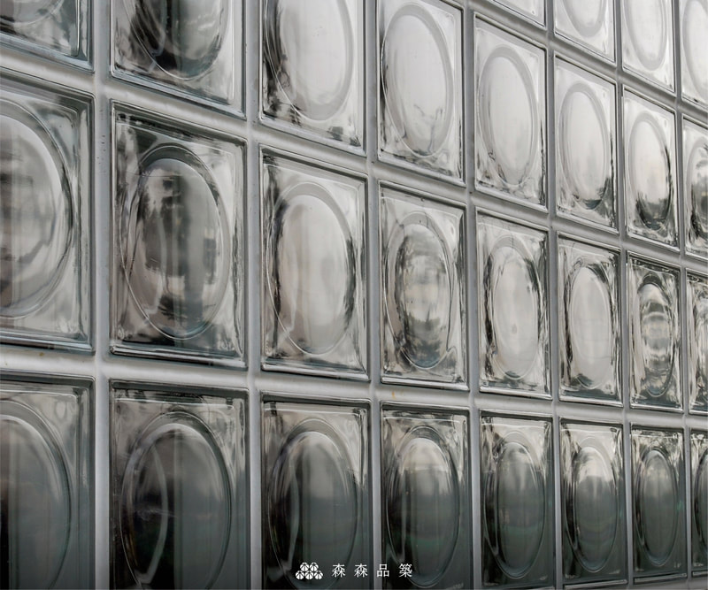 森森品築1908 Alpha全月紋玻璃空心磚建築外牆-新港藝術高中案例分享-森森品築職人工程以精雕細琢的技術，讓每個作品都足以成為藝術。